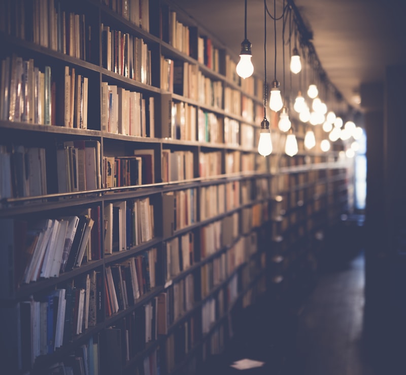 Stack of books ready for browsing in soft light